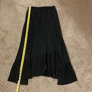 Women’s asymmetrical pleated skirt